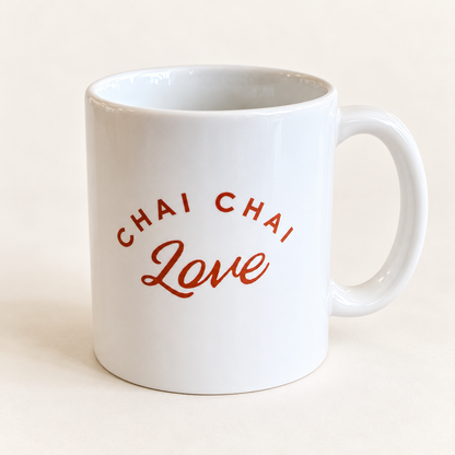 Back of white Chai More, Worry Less mug with rust-red Chai Chai Love logo